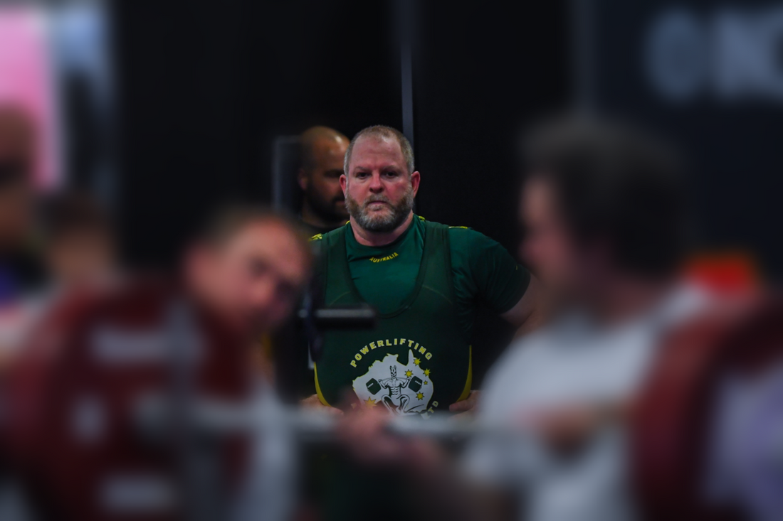 Paul having to draw on all his concentration and inner strength to stay focused amid the chaos at the World Powerlifting Championships